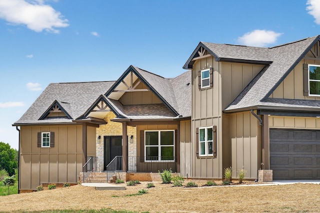 1263 N Sumner Rd, Bethpage, TN 37022 - craftsman inspired home featuring board and batten siding, a shingled roof, and a garage