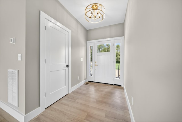 1263 N Sumner Rd, Bethpage, TN 37022 - foyer featuring a chandelier and light wood-type flooring