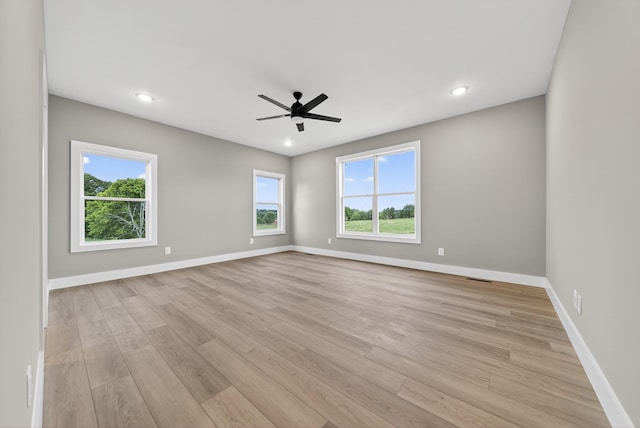 1263 N Sumner Rd, Bethpage, TN 37022 - empty room with healthy amount of natural light, ceiling fan, light wood-style flooring, and recessed lighting