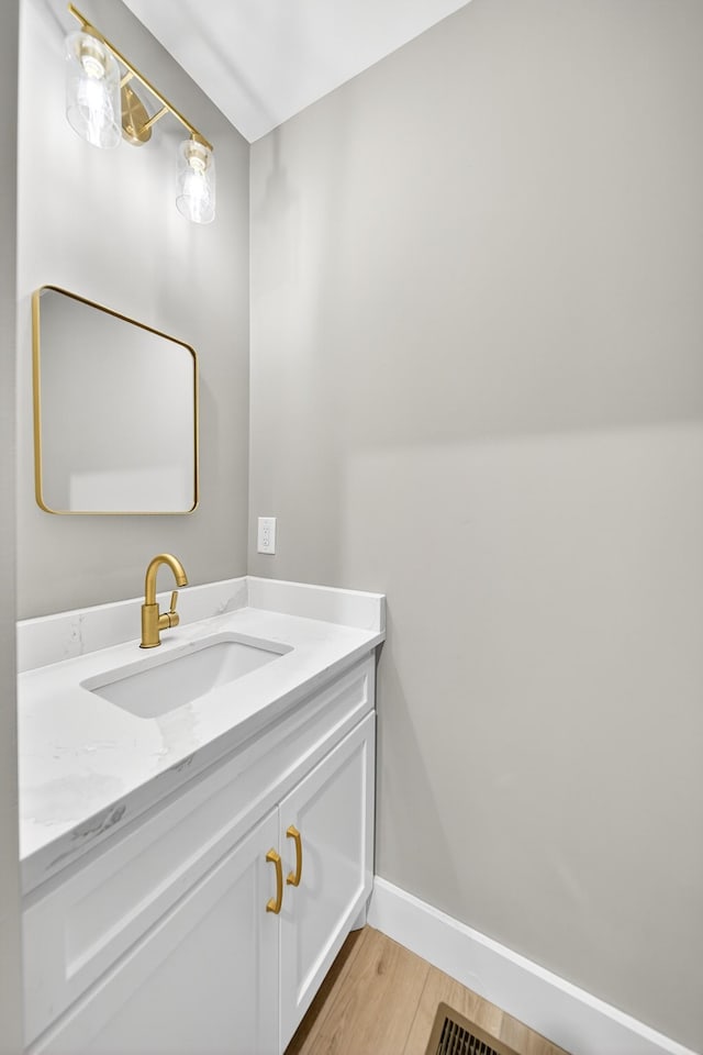 1263 N Sumner Rd, Bethpage, TN 37022 - bathroom with vanity and wood finished floors