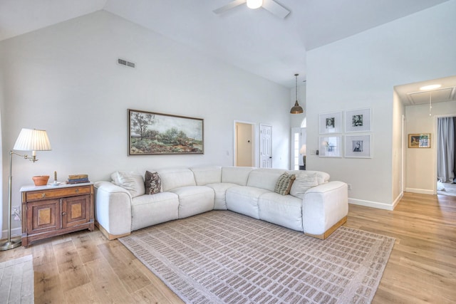 2808 Lafayette Dr, Thompsons Station, TN 37179 - living room with attic access, high vaulted ceiling, light wood finished floors, and a ceiling fan