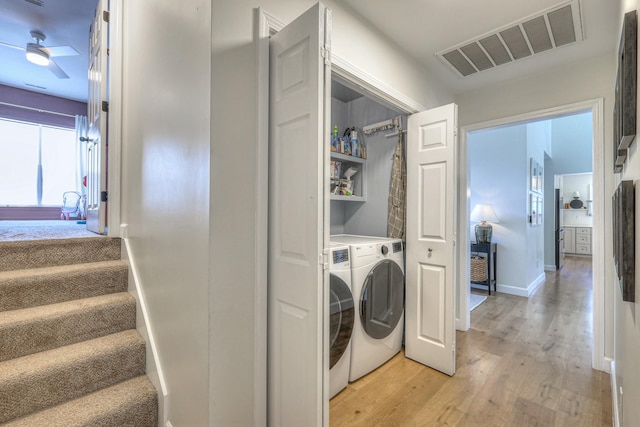 2808 Lafayette Dr, Thompsons Station, TN 37179 - washroom featuring light wood finished floors, washing machine and clothes dryer, and a ceiling fan