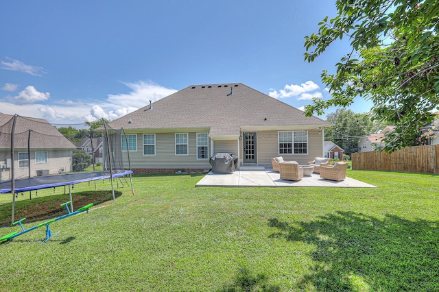 2808 Lafayette Dr, Thompsons Station, TN 37179 - back of house featuring a trampoline, a patio, an outdoor living space, and roof with shingles