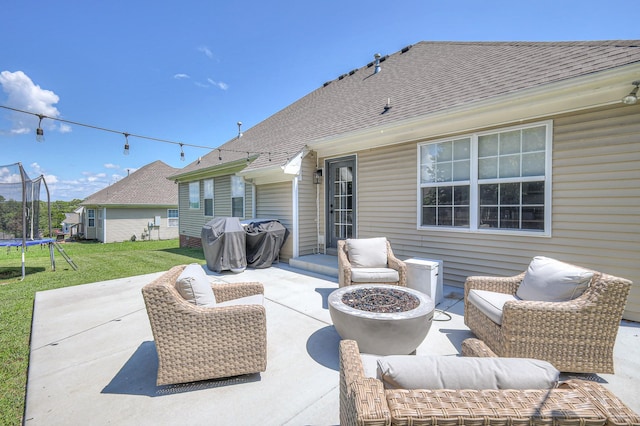 2808 Lafayette Dr, Thompsons Station, TN 37179 - view of patio with a trampoline, an outdoor living space with a fire pit, and area for grilling