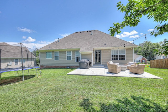 2808 Lafayette Dr, Thompsons Station, TN 37179 - back of house with a trampoline, a patio, an outdoor hangout area, and roof with shingles