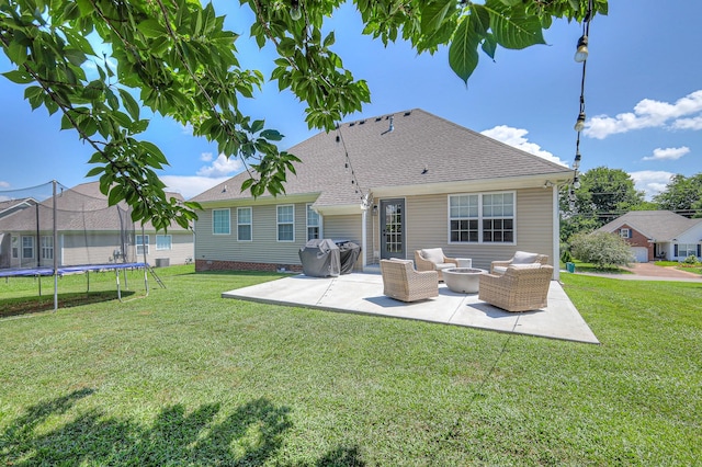 2808 Lafayette Dr, Thompsons Station, TN 37179 - rear view of property featuring a patio area, a trampoline, a yard, and roof with shingles