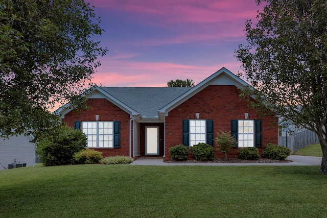 3313 Monoco Dr, Spring Hill, TN 37174 - ranch-style house with brick siding, a lawn, and a shingled roof