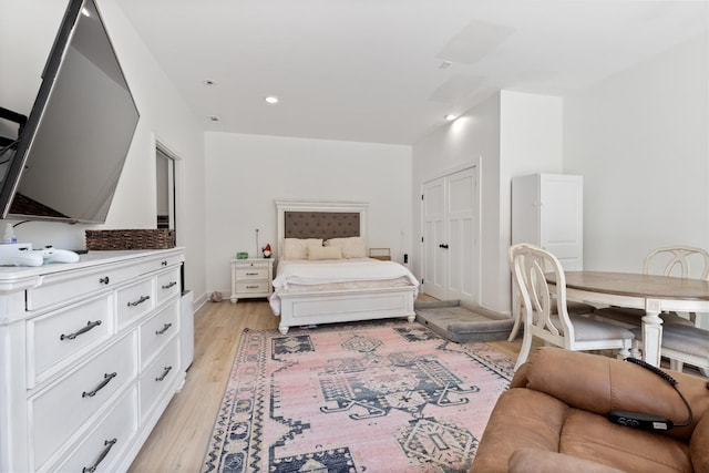 1020 Loggins Rd, Charlotte, TN 37036 - bedroom featuring light wood-type flooring, recessed lighting, and a closet