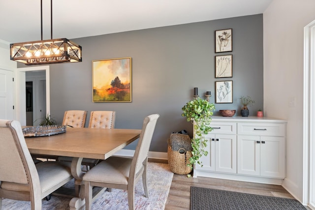 1020 Loggins Rd, Charlotte, TN 37036 - dining area with light wood-style flooring and baseboards
