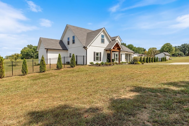 1020 Loggins Rd, Charlotte, TN 37036 - modern inspired farmhouse with a shingled roof, a garage, and board and batten siding