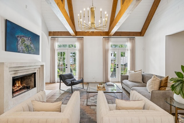 3404 Benham Ave, Nashville, TN 37215 - living area featuring french doors, high vaulted ceiling, a chandelier, wood finished floors, and a wooden ceiling with exposed beams