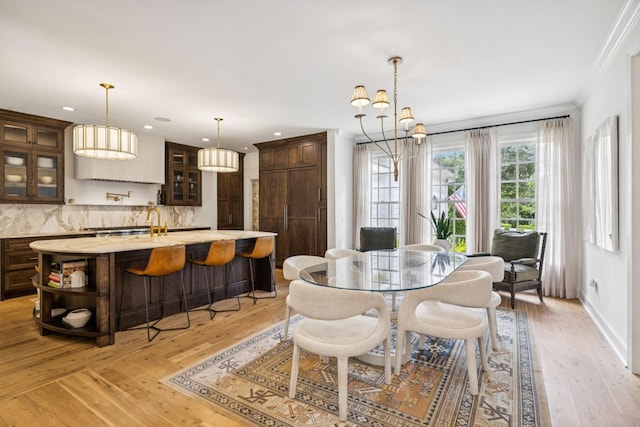 3404 Benham Ave, Nashville, TN 37215 - dining area with crown molding, a chandelier, light wood-style floors, and recessed lighting