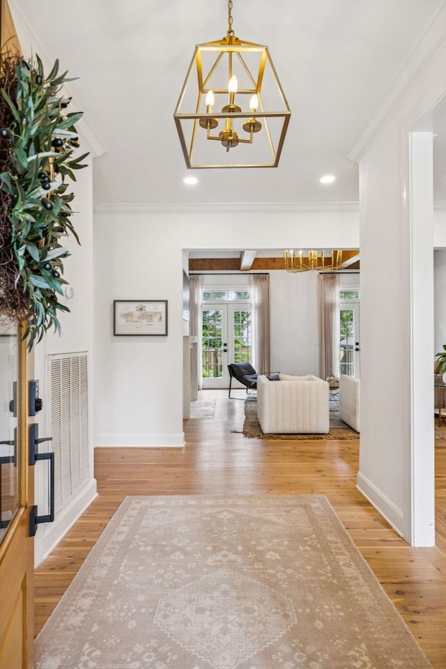 3404 Benham Ave, Nashville, TN 37215 - foyer entrance with ornamental molding, french doors, a chandelier, wood-type flooring, and plenty of natural light
