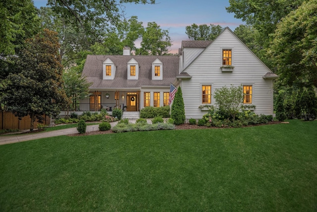 3404 Benham Ave, Nashville, TN 37215 - cape cod home with a front lawn, a porch, and a chimney