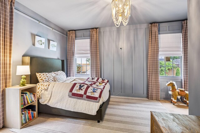 3404 Benham Ave, Nashville, TN 37215 - bedroom with a chandelier and multiple windows