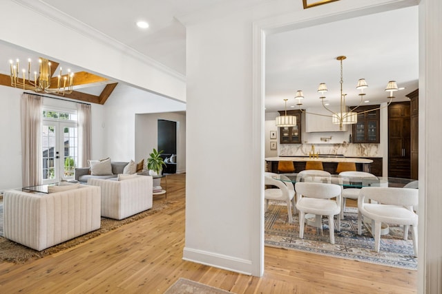 3404 Benham Ave, Nashville, TN 37215 - living area with a chandelier, light wood-style floors, crown molding, french doors, and recessed lighting