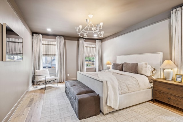 3404 Benham Ave, Nashville, TN 37215 - bedroom with a chandelier, wood finished floors, and recessed lighting