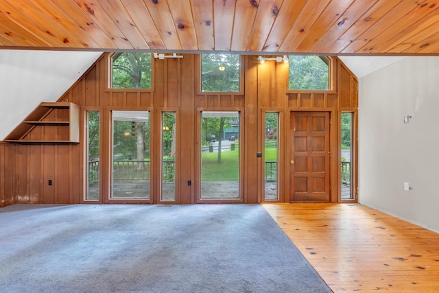 1811 Angel Ln, Signal Mountain, TN 37377 - entrance foyer with healthy amount of natural light, wood walls, wood ceiling, hardwood / wood-style floors, and high vaulted ceiling