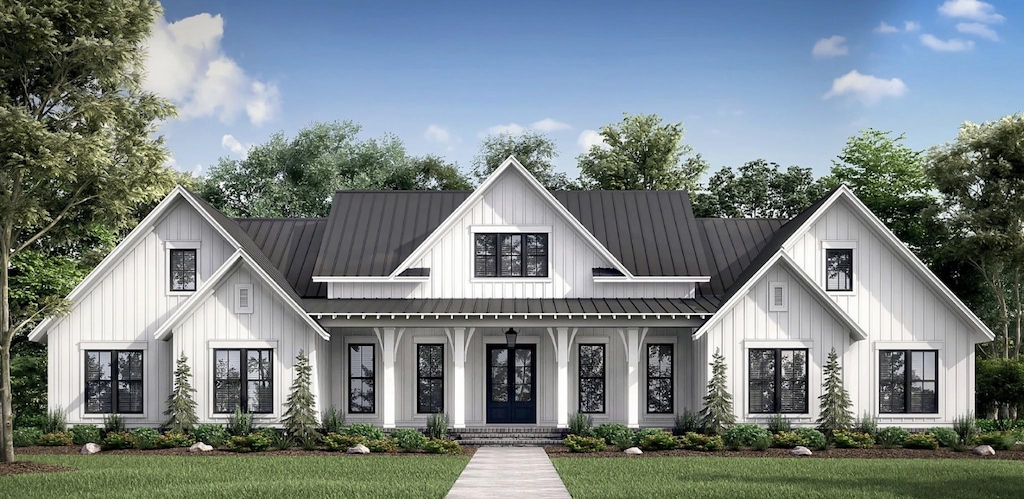 1501 Spencer Mill Rd, Burns, TN 37029 - view of front of home featuring board and batten siding, a porch, a front yard, a standing seam roof, and a metal roof