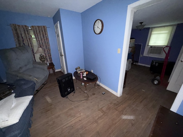 209 Olive St, Mount Pleasant, TN 38474 - living area with wood finished floors and cooling unit