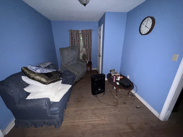 209 Olive St, Mount Pleasant, TN 38474 - sitting room with wood finished floors and baseboards