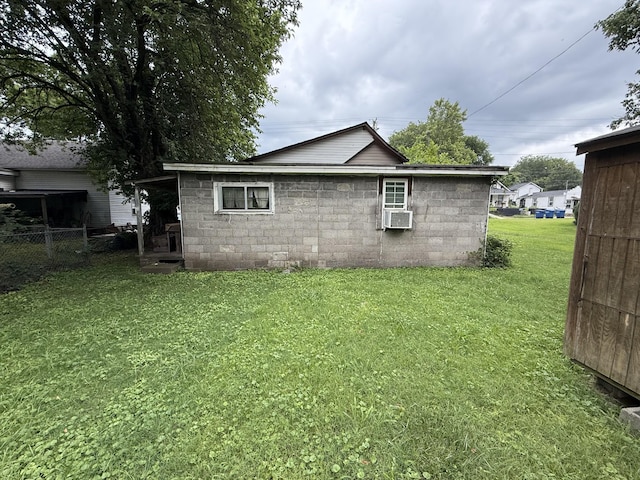 209 Olive St, Mount Pleasant, TN 38474 - view of home's exterior featuring concrete block siding and cooling unit