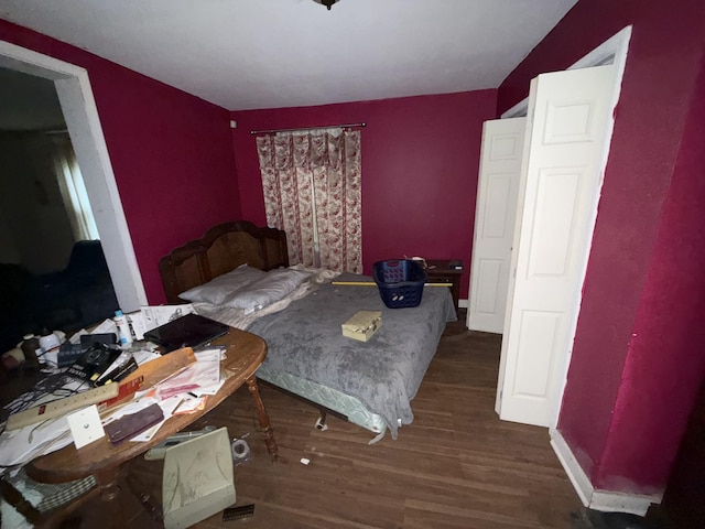209 Olive St, Mount Pleasant, TN 38474 - bedroom with wood finished floors and baseboards