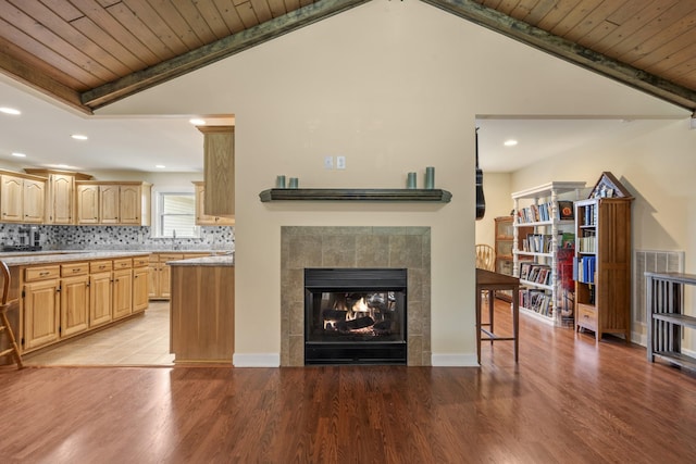 2680 Cedar Grove Rd, Lebanon, TN 37087 - living room featuring a tiled fireplace, light wood-style floors, vaulted ceiling, wood ceiling, and recessed lighting