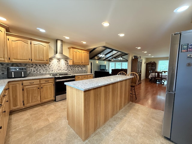 2680 Cedar Grove Rd, Lebanon, TN 37087 - kitchen with appliances with stainless steel finishes, wall chimney exhaust hood, light stone counters, backsplash, and recessed lighting