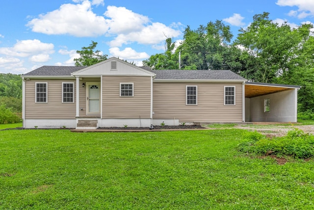 1615 Mohawk Trl, Hopkinsville, KY 42240 - view of front of property featuring a carport, a front lawn, and driveway