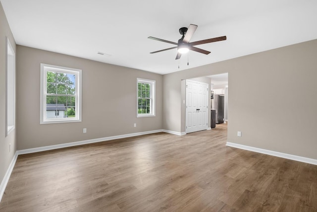1615 Mohawk Trl, Hopkinsville, KY 42240 - empty room with a ceiling fan and wood finished floors