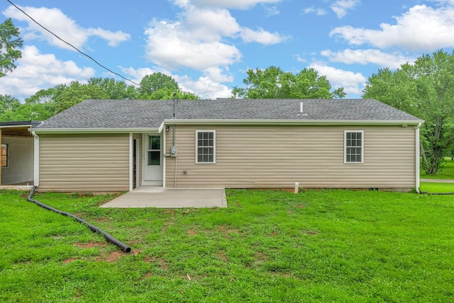 1615 Mohawk Trl, Hopkinsville, KY 42240 - back of house with a patio area and a lawn
