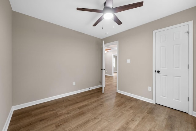 1615 Mohawk Trl, Hopkinsville, KY 42240 - unfurnished bedroom with light wood-type flooring and ceiling fan