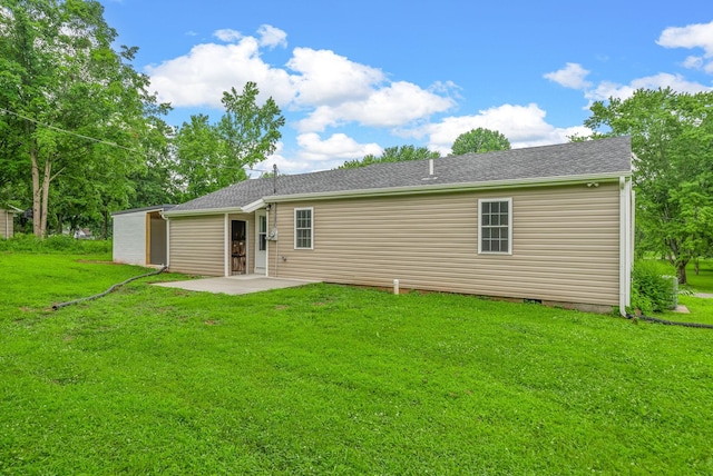 1615 Mohawk Trl, Hopkinsville, KY 42240 - rear view of house with a patio area and a yard