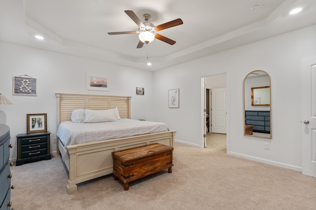 611 Hawkeye Ct, Eagleville, TN 37060 - bedroom featuring a tray ceiling, light colored carpet, recessed lighting, and a ceiling fan