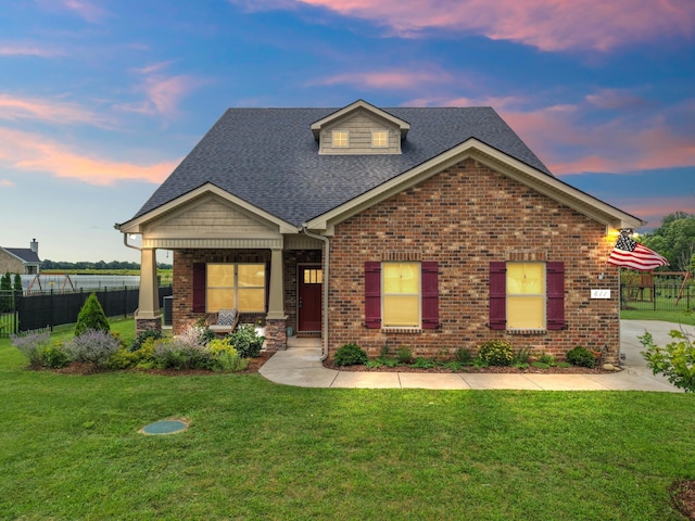611 Hawkeye Ct, Eagleville, TN 37060 - view of front of home featuring roof with shingles, covered porch, and brick siding