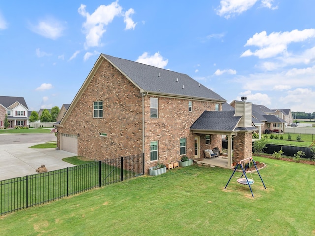 611 Hawkeye Ct, Eagleville, TN 37060 - rear view of property featuring driveway, a fenced backyard, a patio, roof with shingles, and brick siding