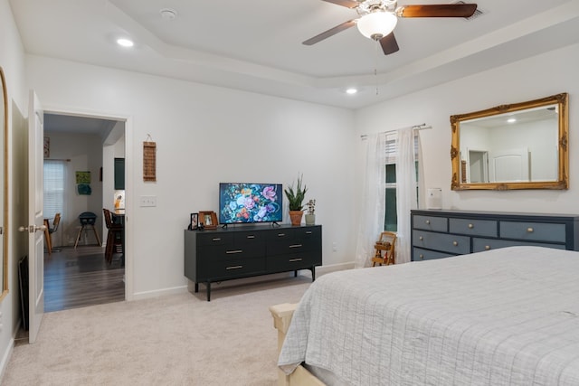 611 Hawkeye Ct, Eagleville, TN 37060 - bedroom featuring light carpet, recessed lighting, a tray ceiling, and a ceiling fan