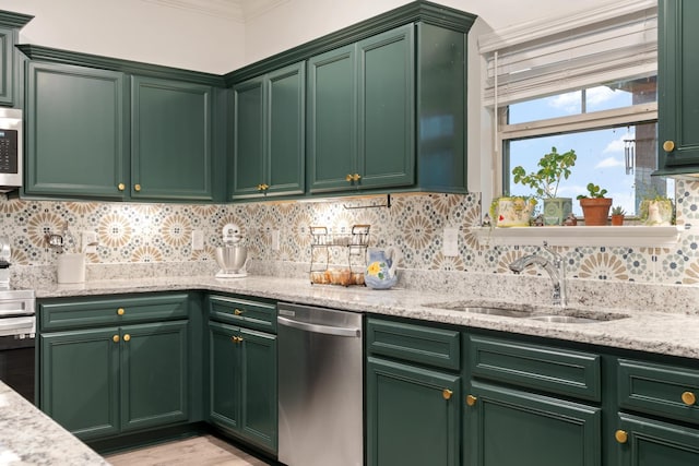 611 Hawkeye Ct, Eagleville, TN 37060 - kitchen with stainless steel dishwasher, crown molding, tasteful backsplash, green cabinetry, and light stone counters