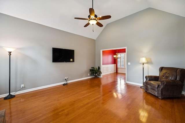 2707 Albany Ct, Murfreesboro, TN 37129 - living area featuring a ceiling fan, a chandelier, wood finished floors, and high vaulted ceiling