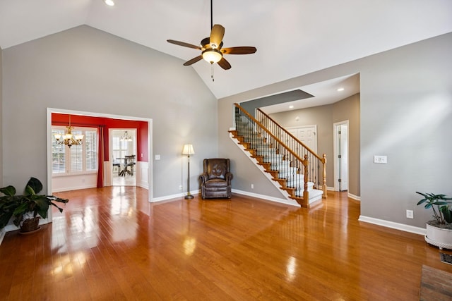 2707 Albany Ct, Murfreesboro, TN 37129 - living room featuring a chandelier, stairs, high vaulted ceiling, wood finished floors, and a ceiling fan