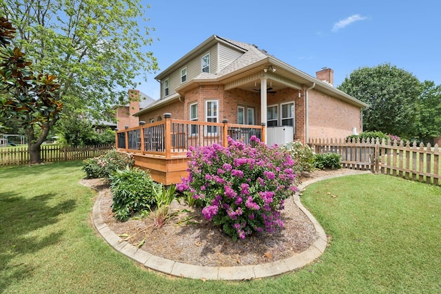 2707 Albany Ct, Murfreesboro, TN 37129 - back of house with ceiling fan, brick siding, a chimney, and a wooden deck