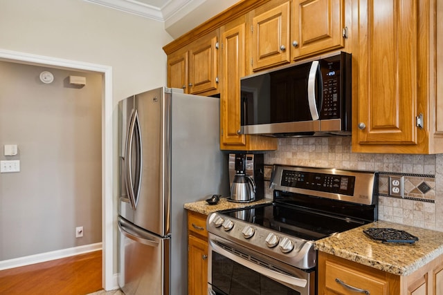 2707 Albany Ct, Murfreesboro, TN 37129 - kitchen with appliances with stainless steel finishes, ornamental molding, brown cabinetry, decorative backsplash, and light stone counters