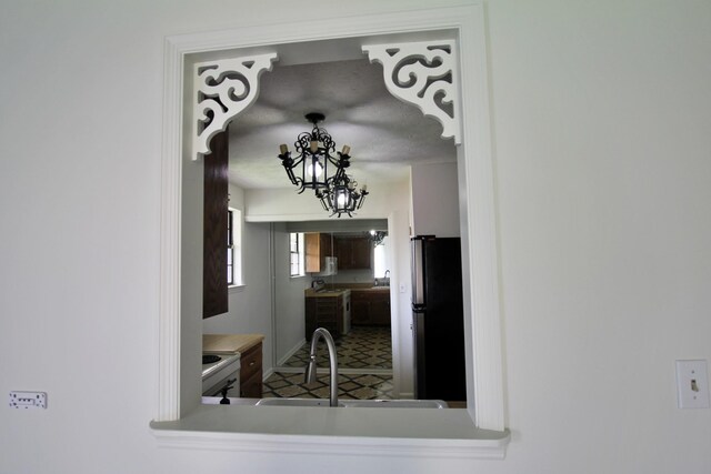 2117 Mockingbird Ln Unit A, Springfield, TN 37172 - detailed view of freestanding refrigerator and a chandelier