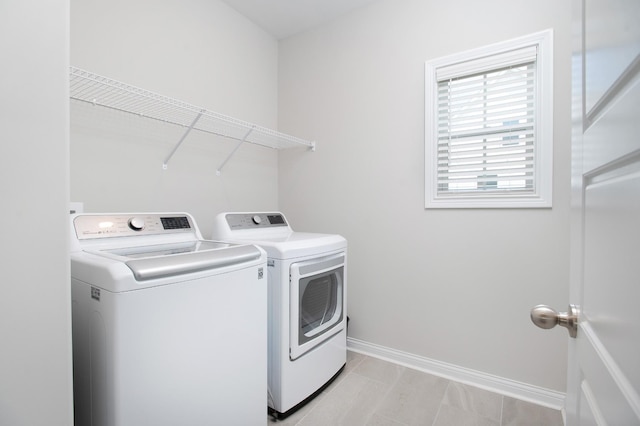 118 Colson Rd, Dover, TN 37058 - washroom with independent washer and dryer and light tile patterned flooring