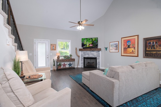118 Colson Rd, Dover, TN 37058 - living area featuring wood finished floors, a fireplace, ceiling fan, high vaulted ceiling, and stairs