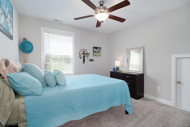 118 Colson Rd, Dover, TN 37058 - carpeted bedroom featuring multiple windows and a ceiling fan