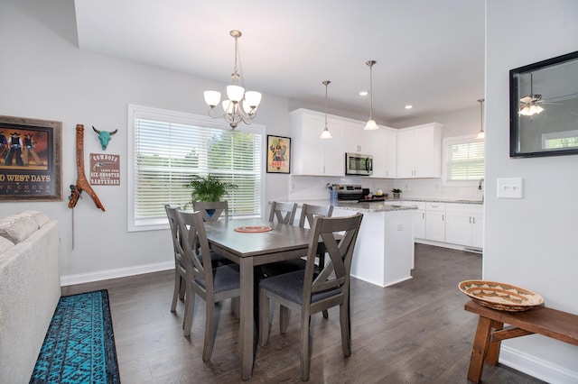 118 Colson Rd, Dover, TN 37058 - dining area featuring dark wood-style floors, a chandelier, a ceiling fan, and recessed lighting