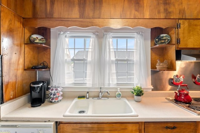 3102 Crescent Cir, Chattanooga, TN 37407 - kitchen with open shelves, range hood, light countertops, and brown cabinetry
