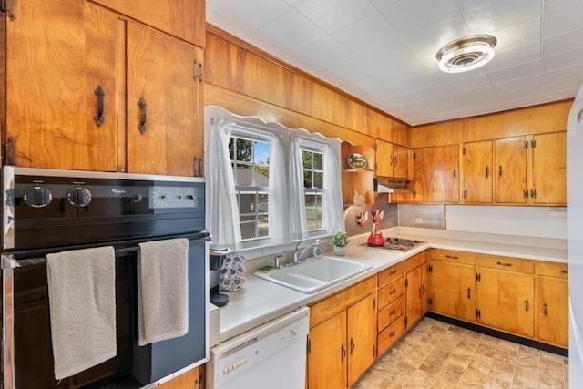3102 Crescent Cir, Chattanooga, TN 37407 - kitchen featuring oven, dishwasher, stainless steel gas stovetop, light countertops, and brown cabinets